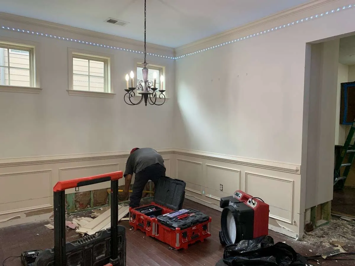 Restoration technician with professional equipment in South Miami